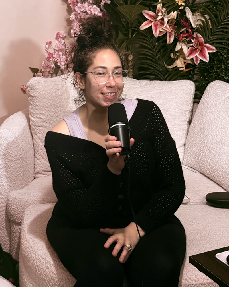 Pamela Krista recording her podcast